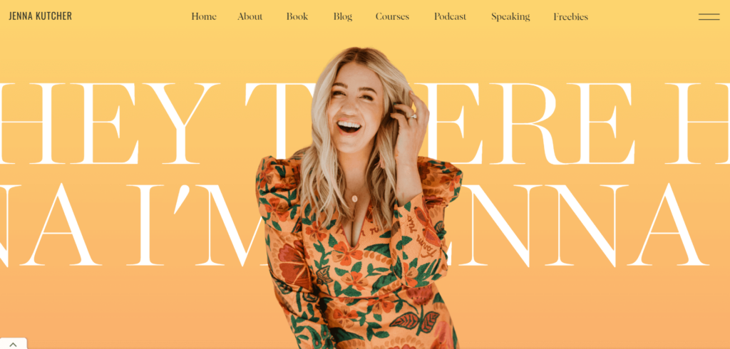 A picture of Jenna Kutcher's Website Home Page with bright yellow and Orange Colors and a Picture of her Smiling. 